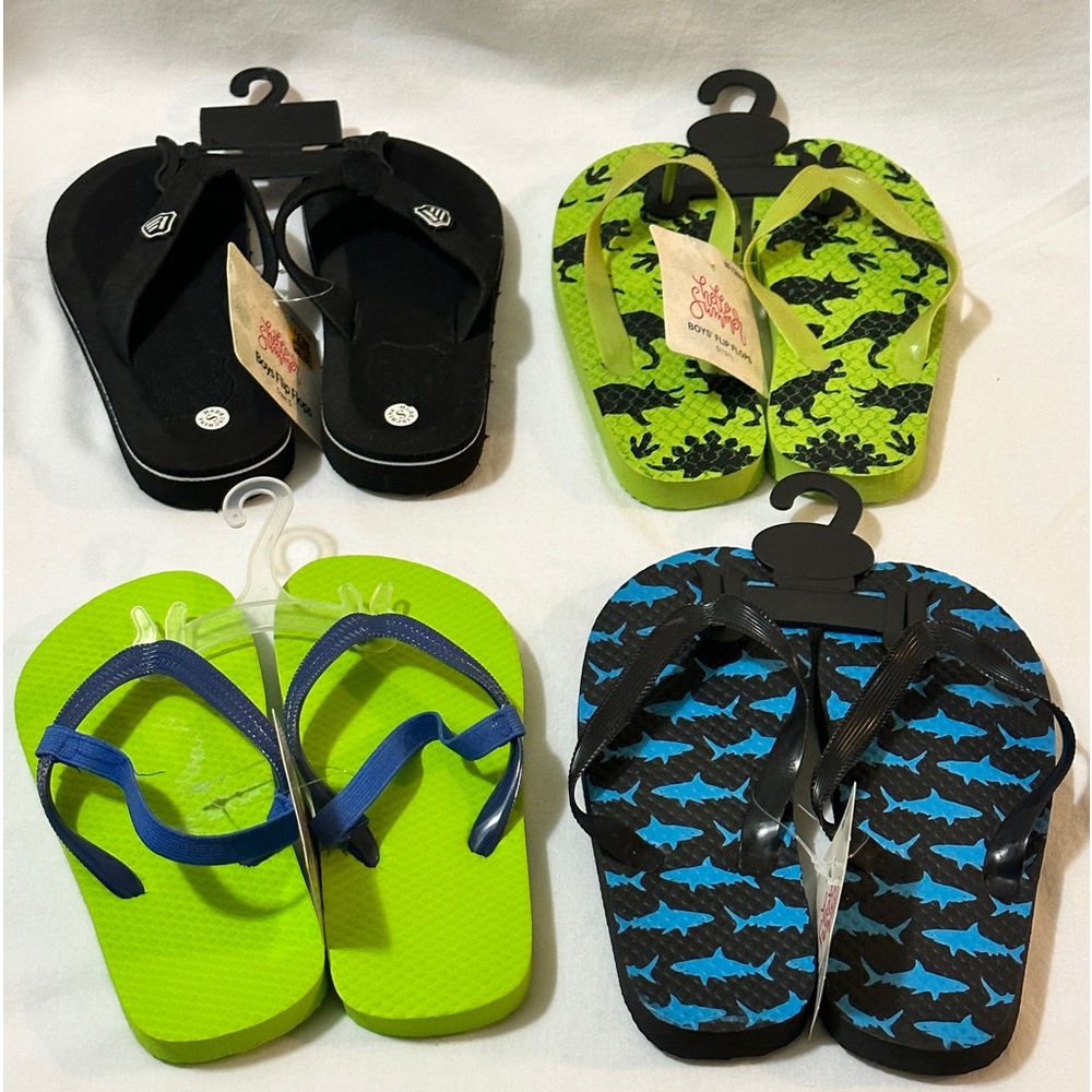 Four pair of Kids size 13-1 flip flops